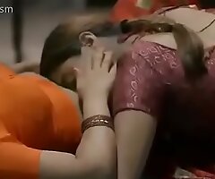 Sexy women relating to saree kissing