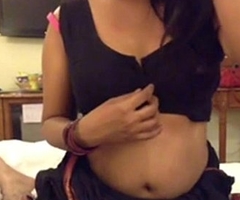 Hot Desi Bhabhi Showing Chunky Boobs n Putting in Condom on Dick