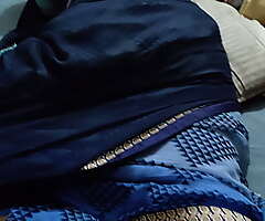 Desi curvy big ass bhabhi wearing saree lying on bed recorded by their way devar as a voyeur