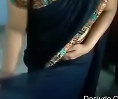 Indian aunty showing how helter-skelter act upon a saree( Desivdo.com )