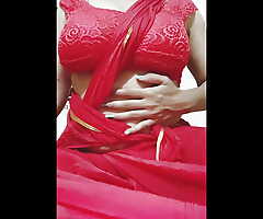 boobs show in off colour red saree yammy