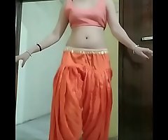 Indian girl Nidhi doing belly dance companionable